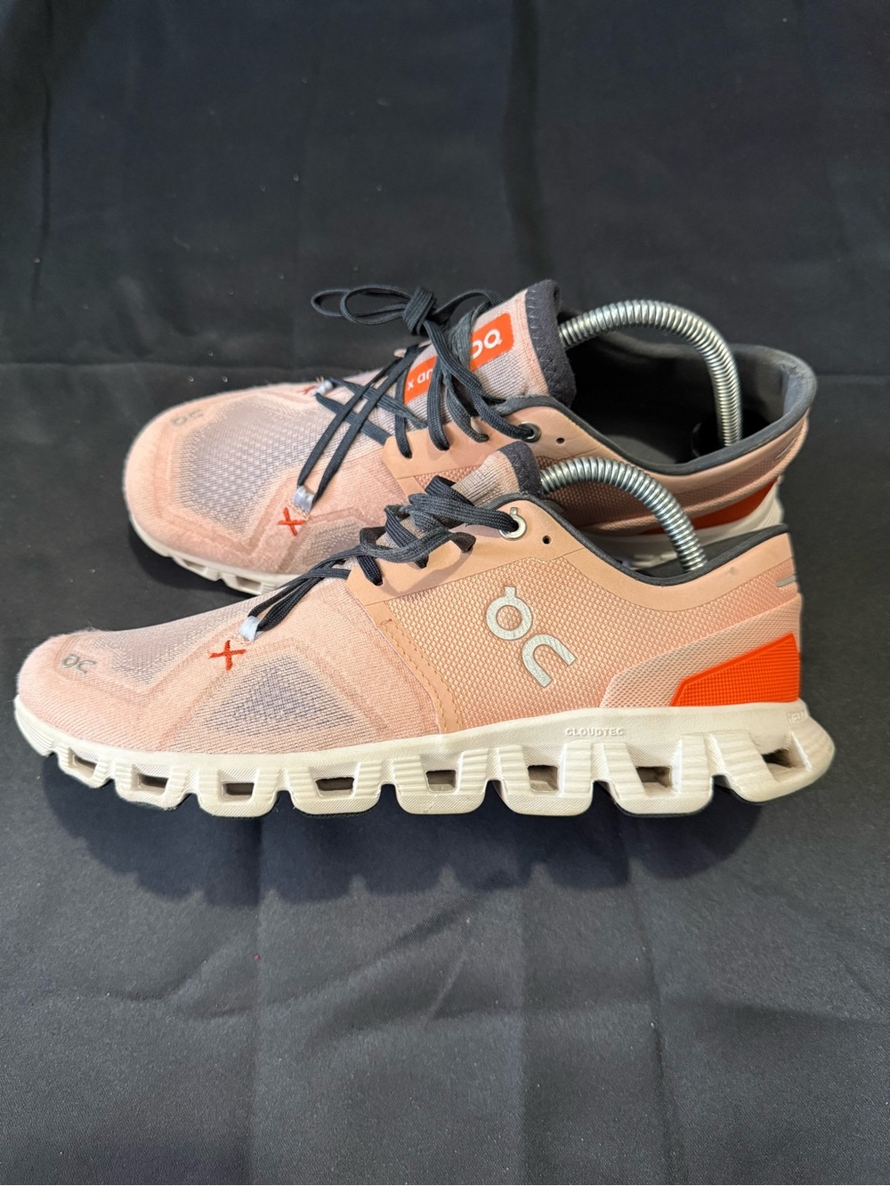 On clouds Running Women’s Pink Athletic Running Shoes with Orange Accent